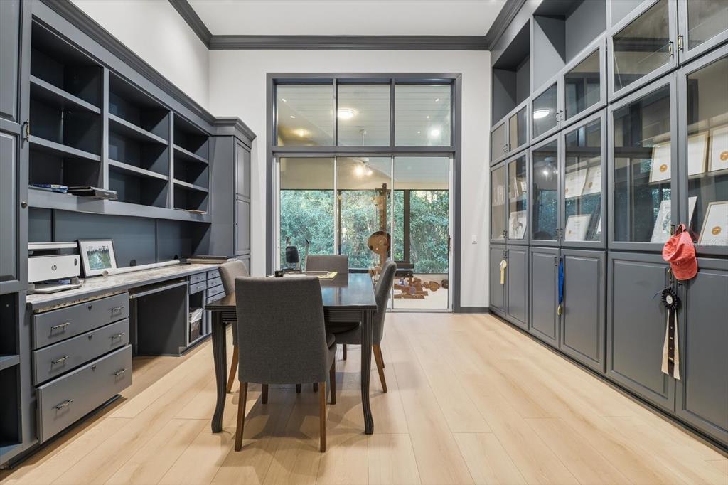 3255 North Pinelake Village Point Lecanto, FL 34461 - Photo 25 of 69 a view of a dining room with furniture and a window
