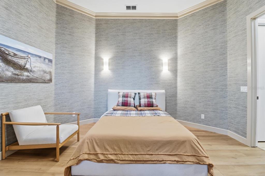 3255 North Pinelake Village Point Lecanto, FL 34461 - Photo 31 of 69 a bedroom with a bed and a couch