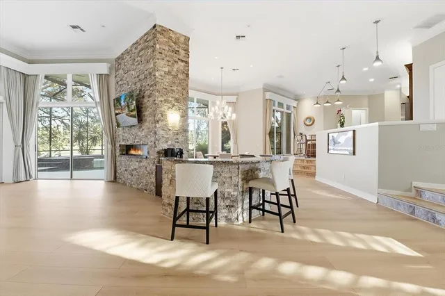 a view of a dining room with furniture window and outside view