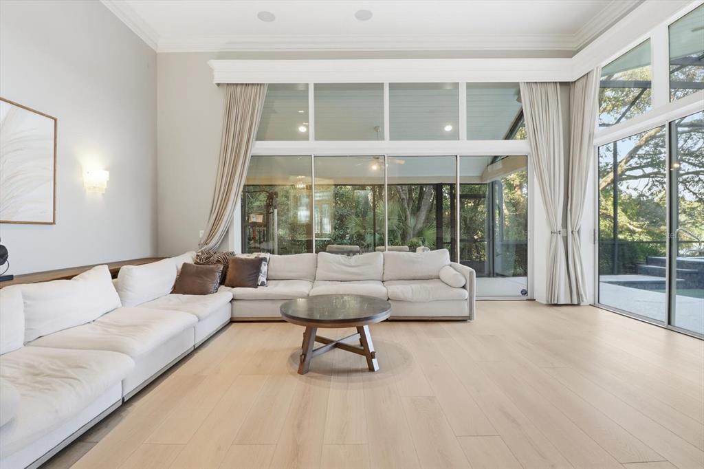 3255 North Pinelake Village Point Lecanto, FL 34461 - Photo 7 of 69 a living room with furniture and a large window