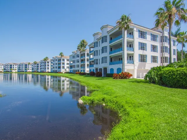 a view of an apartment with a lake view