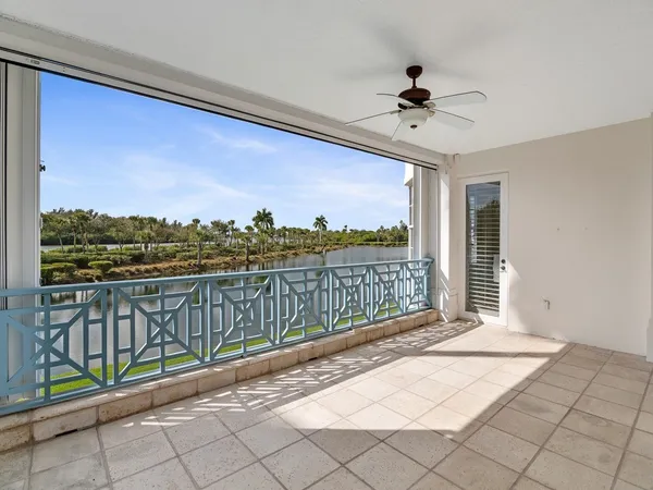 a view of a balcony with furniture