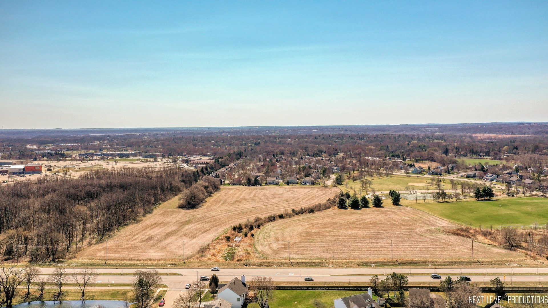 0 Huntley Road West Dundee, IL 60118 - Photo 1 of 2 an aerial view of residential houses with outdoor space and trees