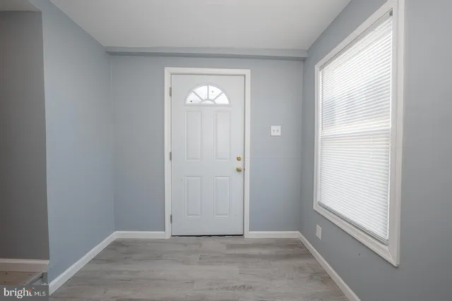 an empty room with window