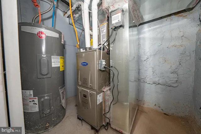 a bathroom with a granite countertop shower and a sink