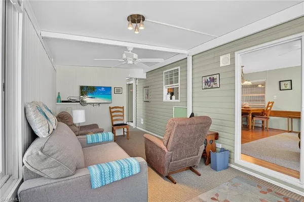 a bathroom with a sink a vanity and a window