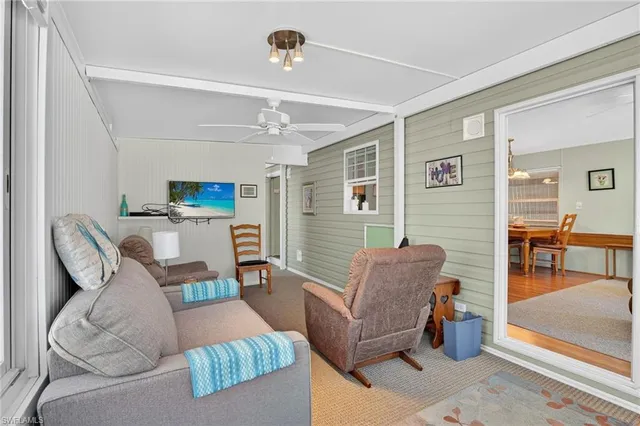 a bathroom with a sink a vanity and a window