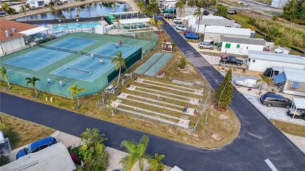 a view of a balcony with sitting area