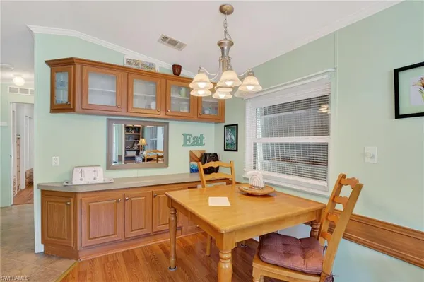 a dining room with a table chairs and a dining table view