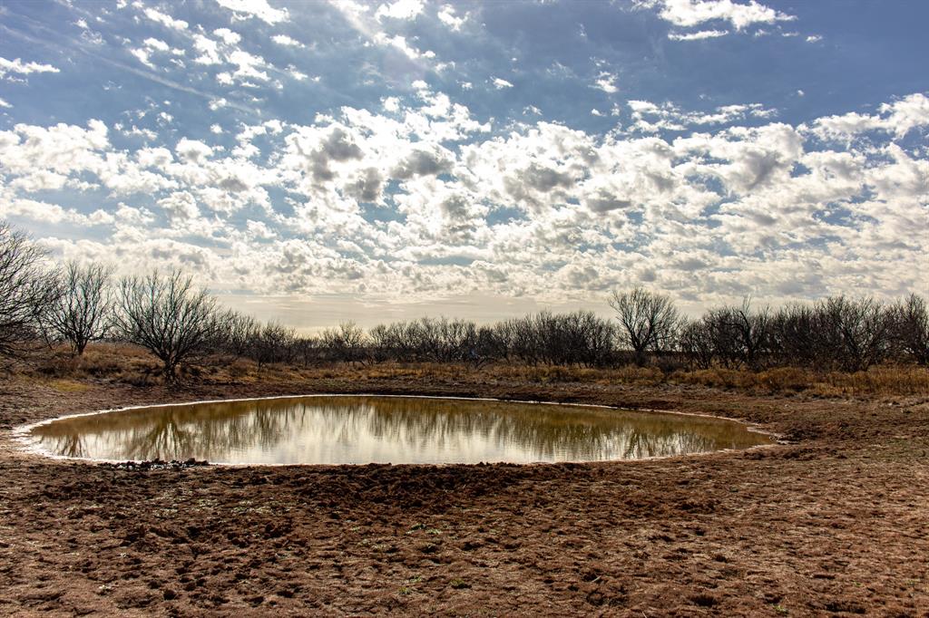 Tbd North Westover Road Seymour, TX 76380 - Photo 8 of 40 a view of a lake with houses in the background