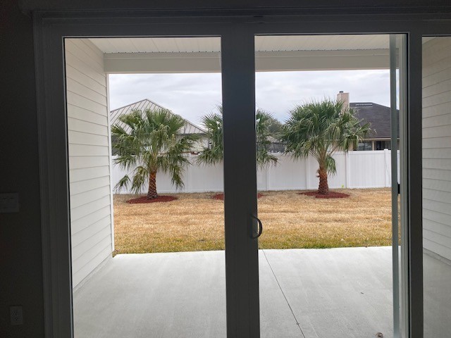 85236 Sandy Rdg Loop Yulee, FL 32097 - Photo 17 of 19 a view of a living room and a porch