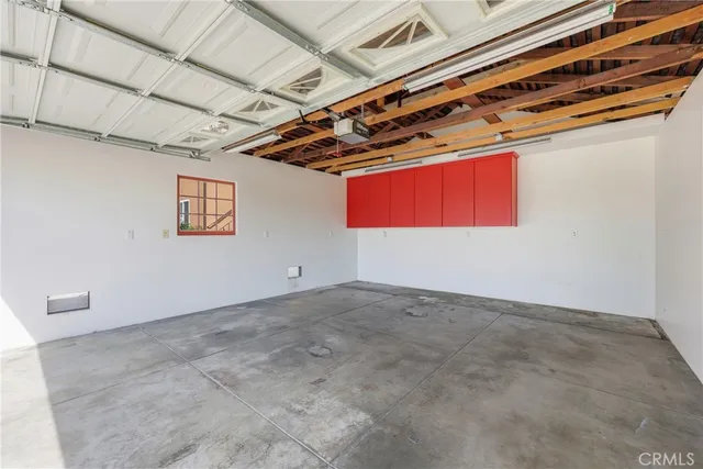 a view of a room with wooden walls