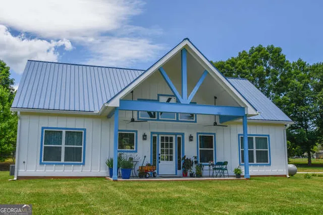 a view of a house with garden