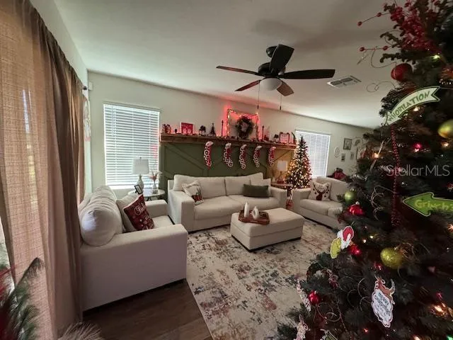 a living room with furniture and a window