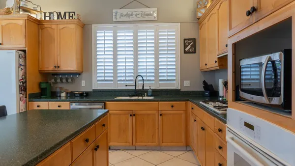 a view of a hallway with workspace