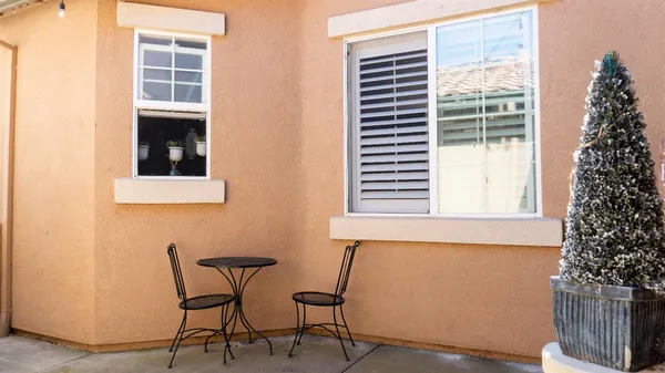 a view of a room that has a bed and a chair