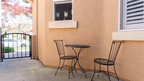 a room with furniture and pool table