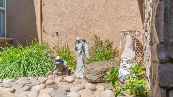a room with table chairs and entryway