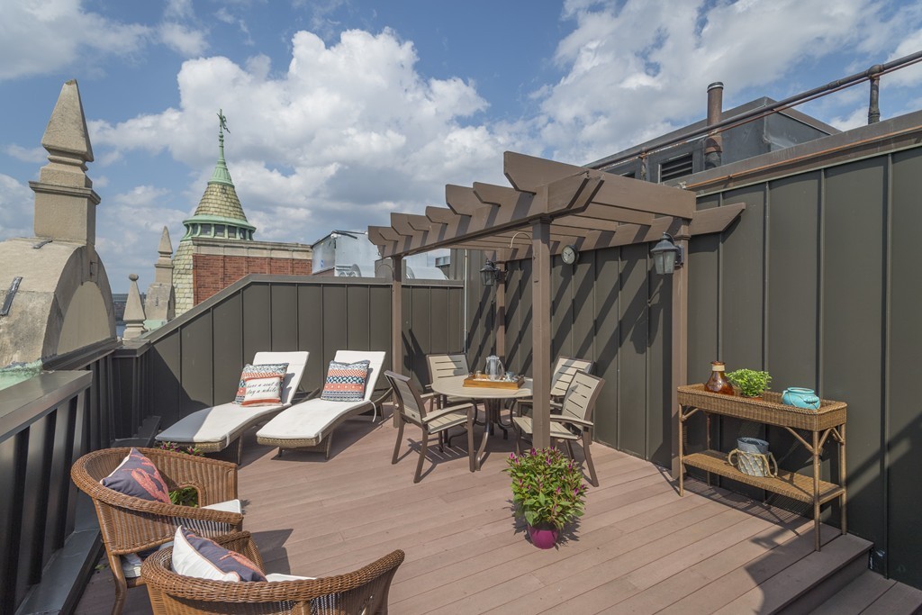 a roof deck with couch