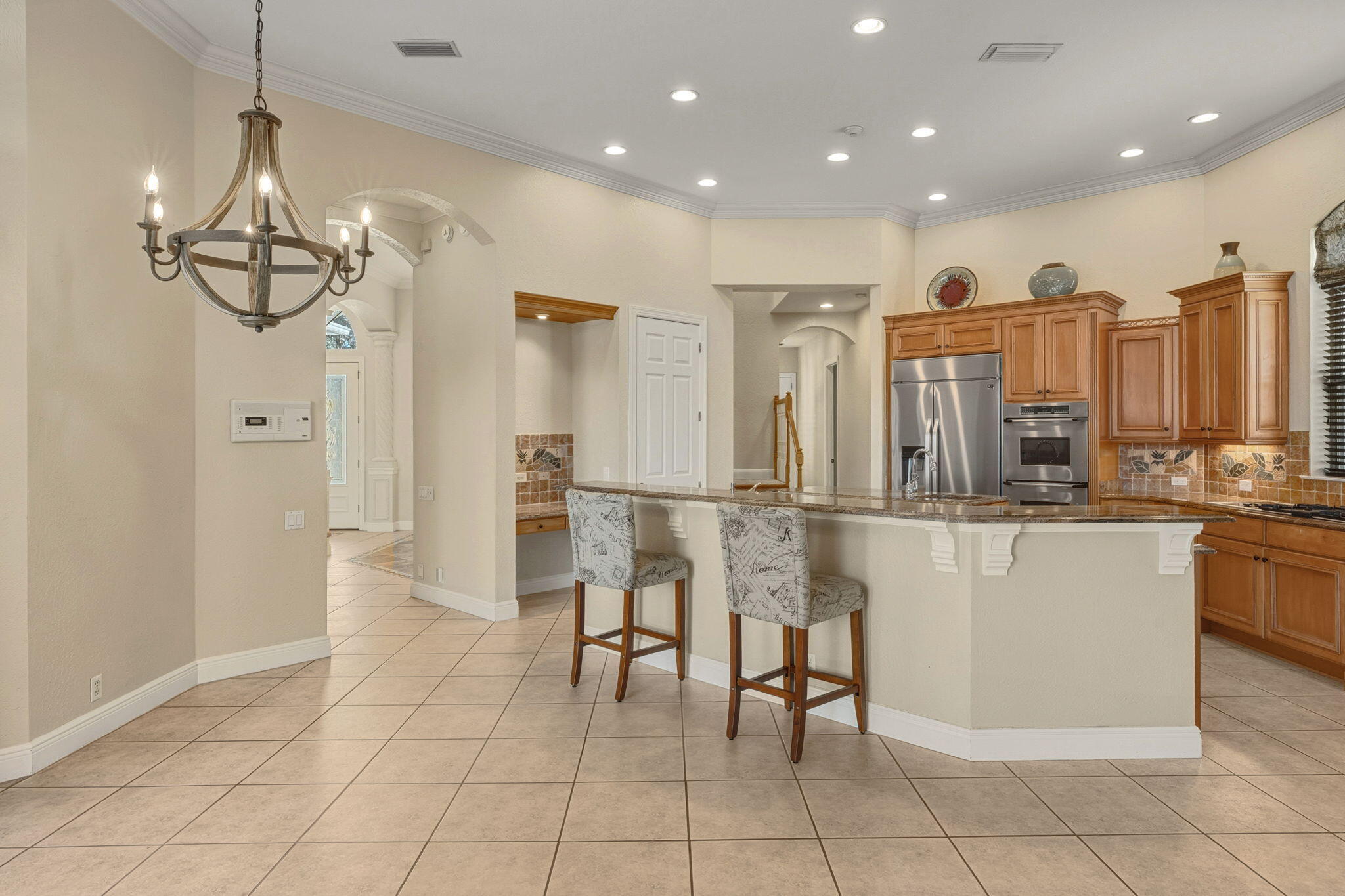 4327 Stonebridge Road Destin, FL 32541 - Photo 12 of 51 a view of kitchen with refrigerator and window