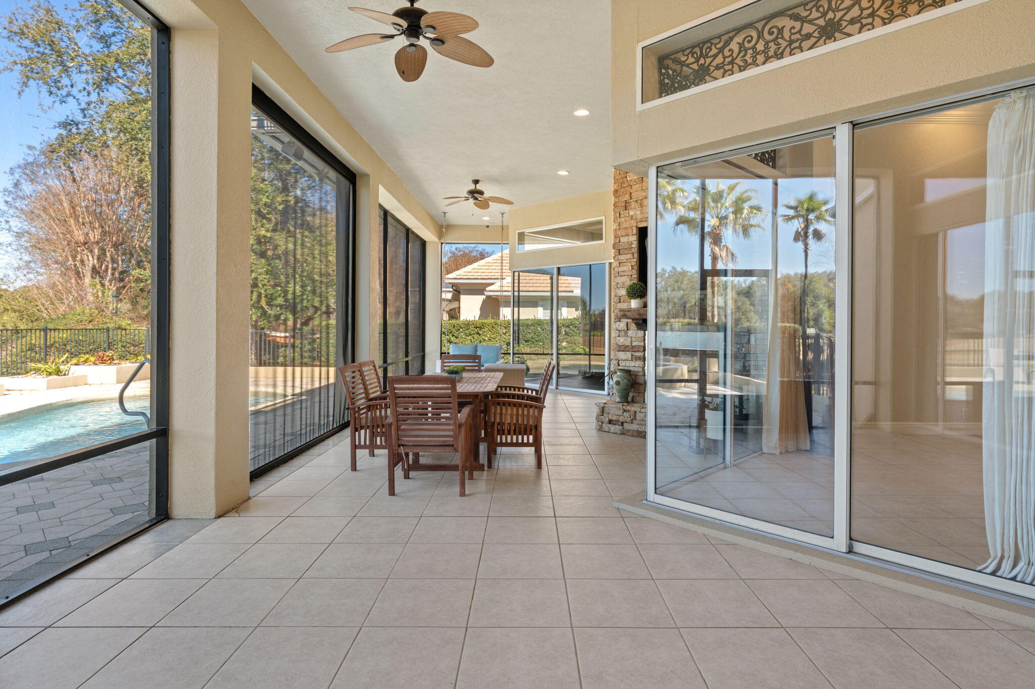 4327 Stonebridge Road Destin, FL 32541 - Photo 16 of 51 a lobby with furniture and floor to ceiling window