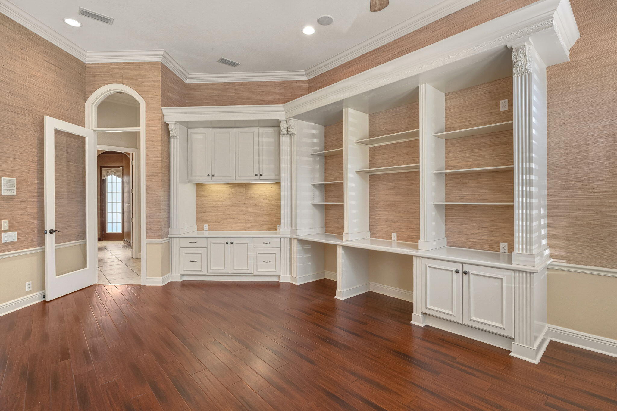 4327 Stonebridge Road Destin, FL 32541 - Photo 20 of 51 a view of an empty room with a window and wooden floor