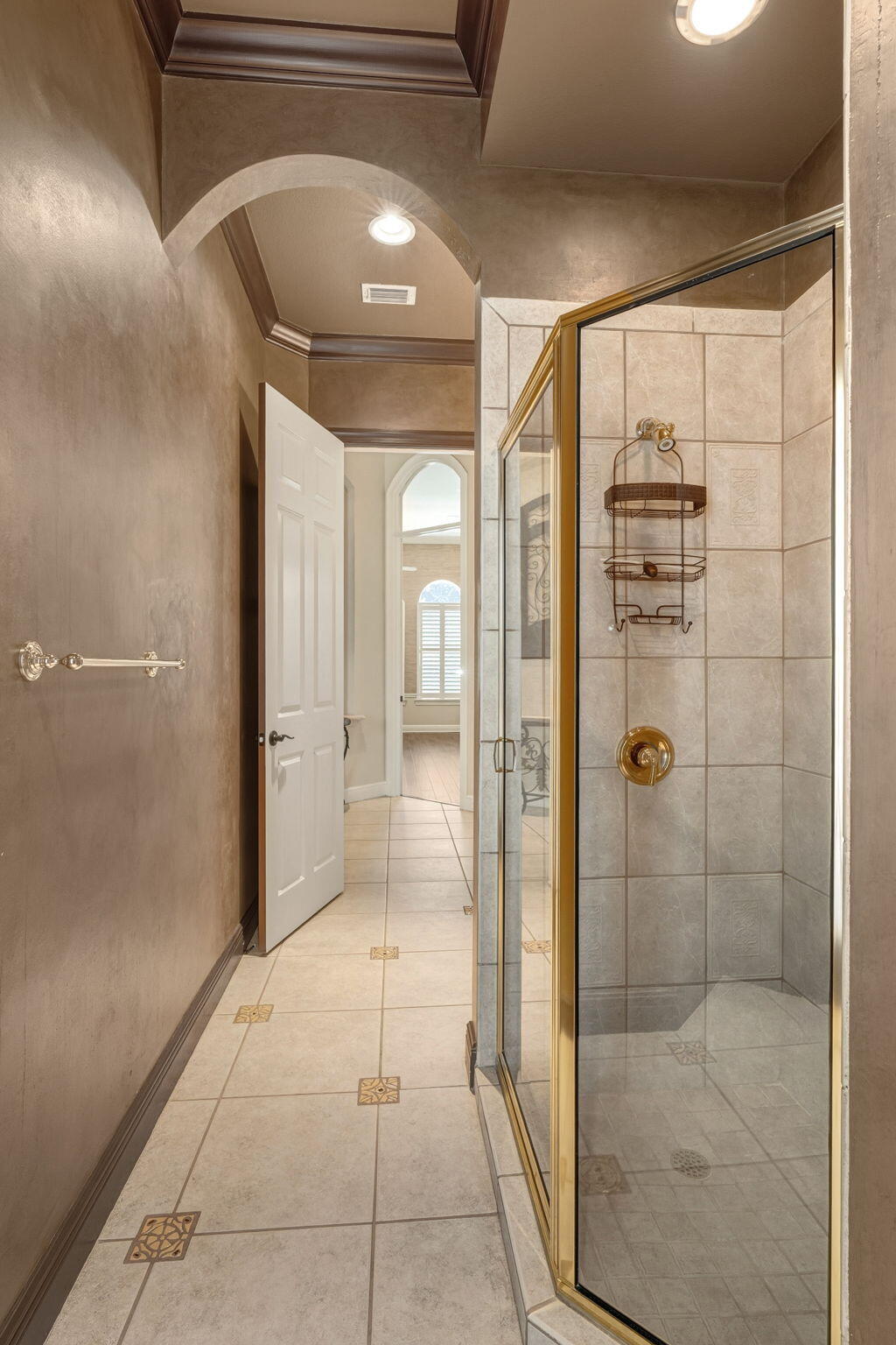 4327 Stonebridge Road Destin, FL 32541 - Photo 22 of 51 a bathroom with a glass shower door