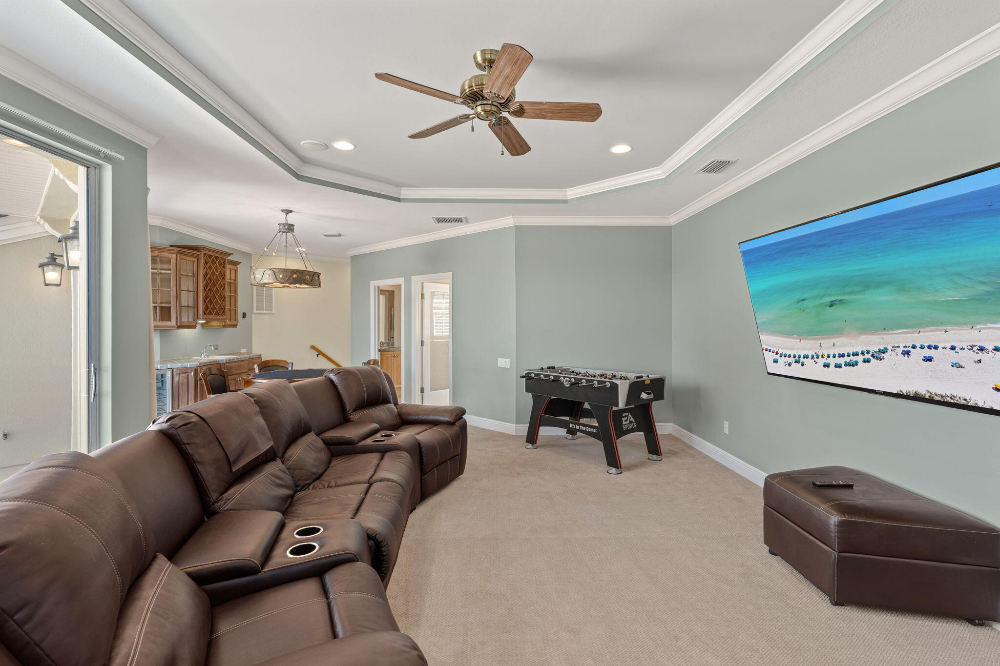 4327 Stonebridge Road Destin, FL 32541 - Photo 39 of 51 a living room with furniture a ceiling fan and a rug