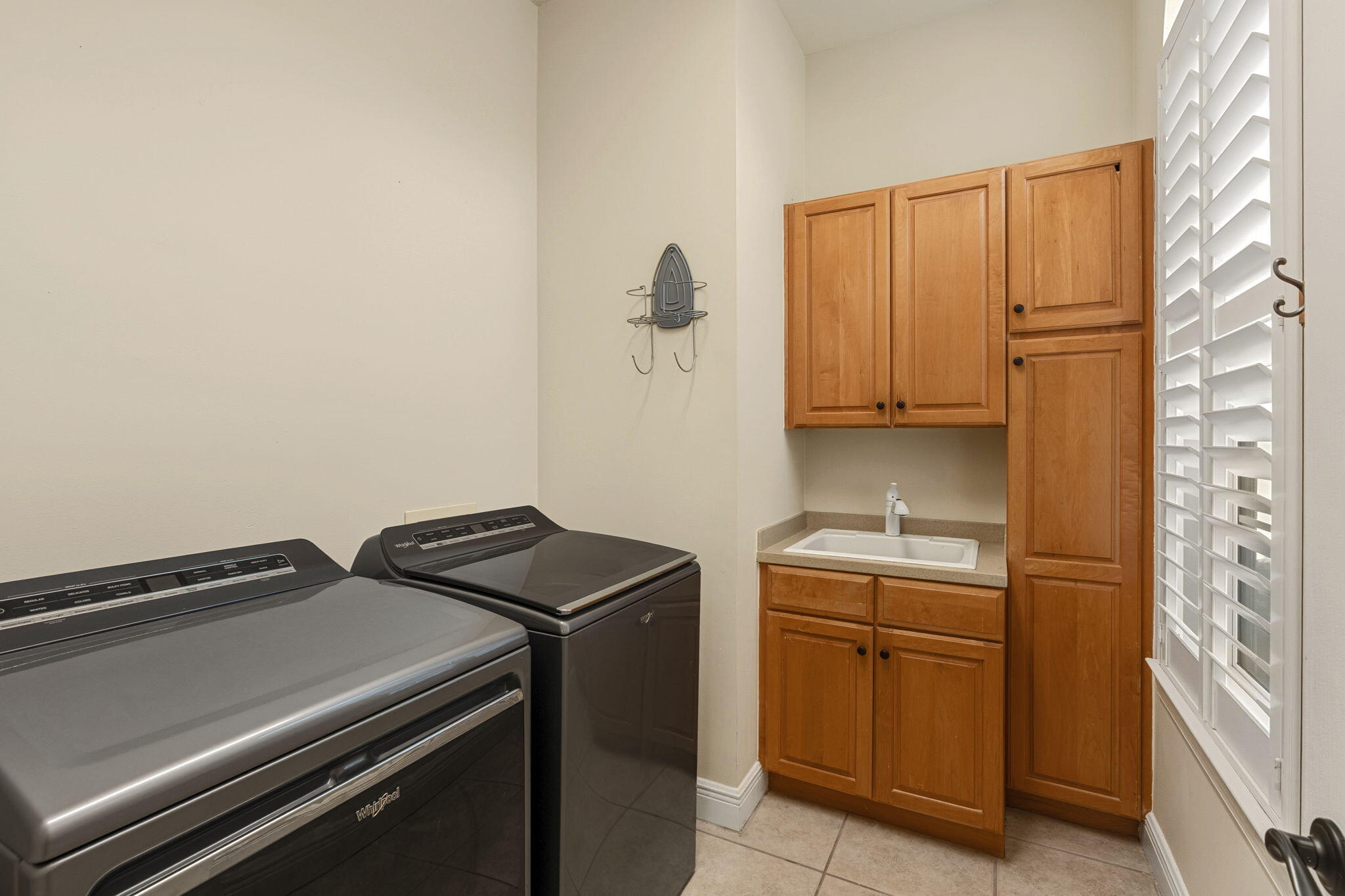 4327 Stonebridge Road Destin, FL 32541 - Photo 42 of 51 a utility room with dryer and washer
