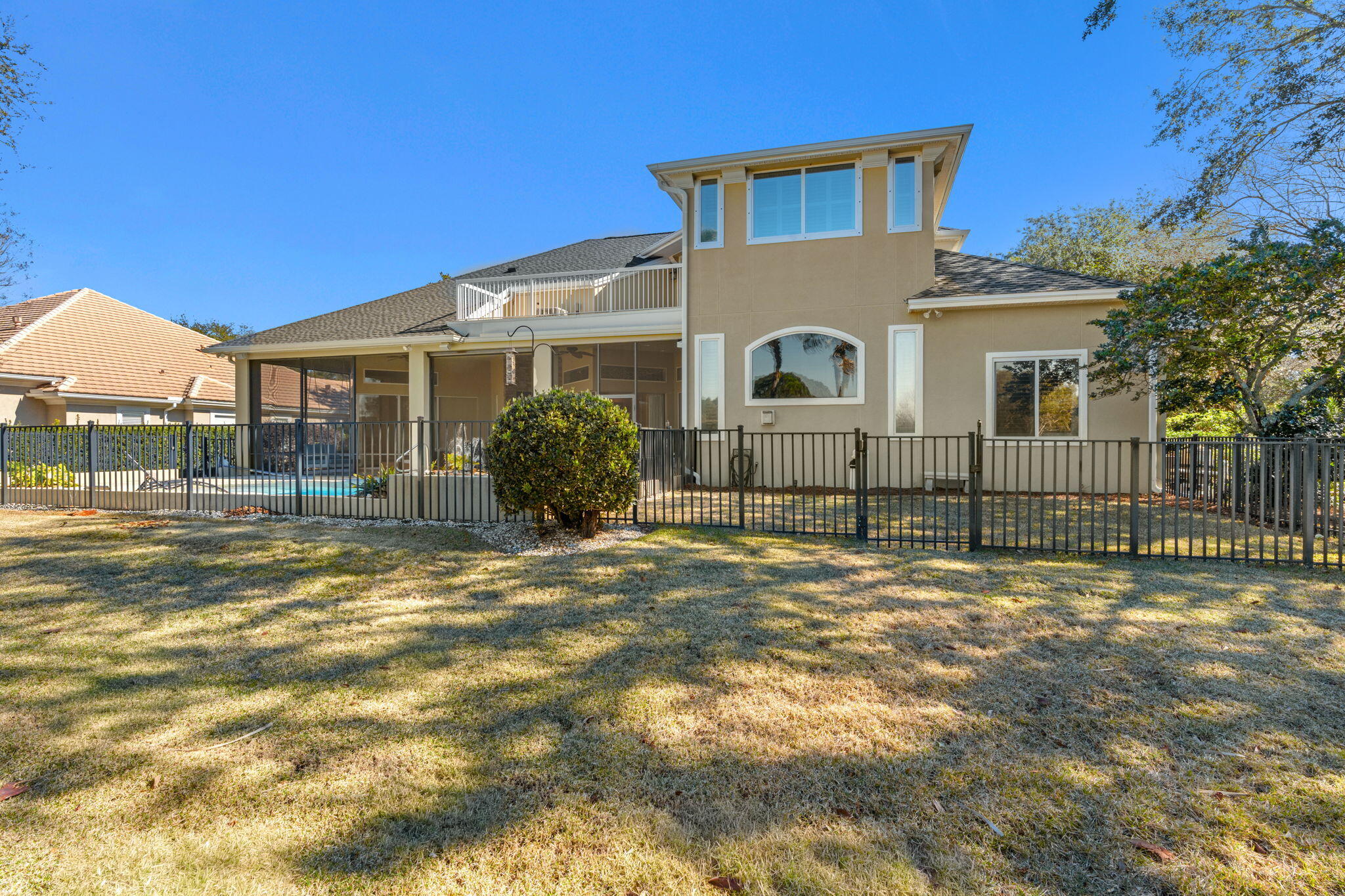 4327 Stonebridge Road Destin, FL 32541 - Photo 48 of 51 a view of a house with backyard and a tree