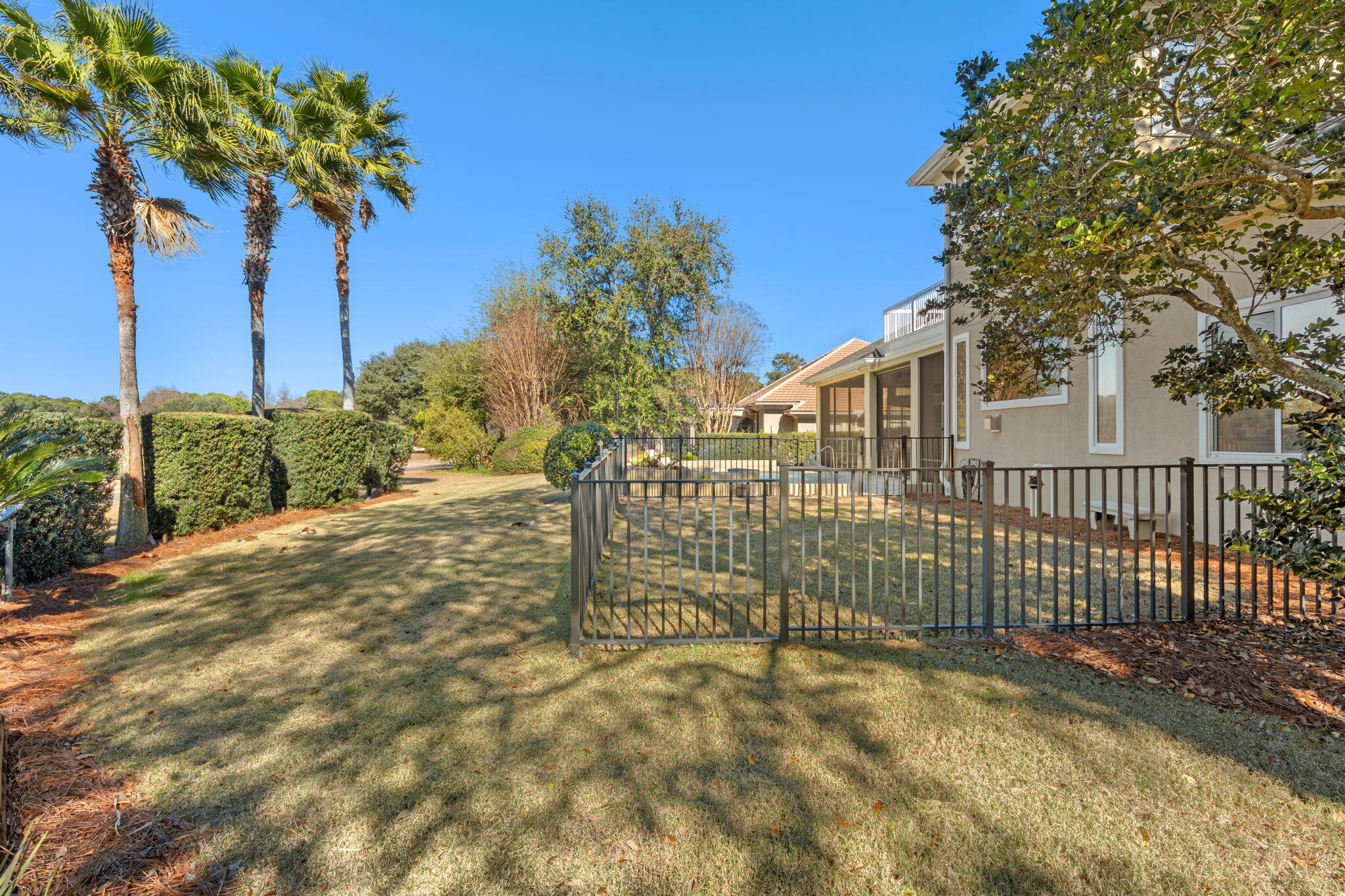 4327 Stonebridge Road Destin, FL 32541 - Photo 50 of 51 a view of a yard with plants and trees