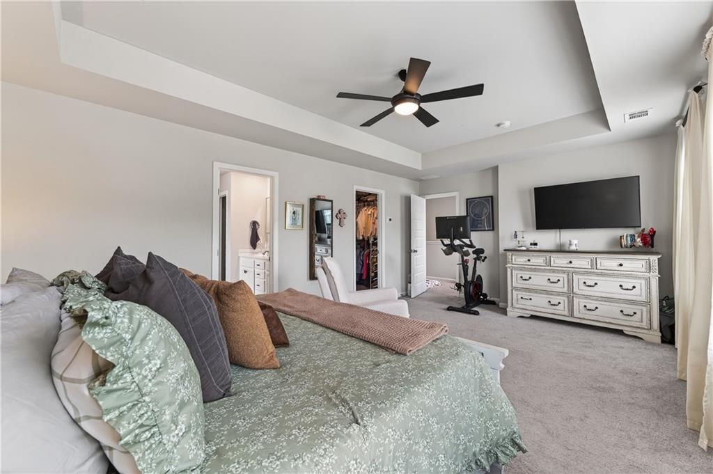 266 Shoals Bridge Road Acworth, GA 30102 - Photo 24 of 43 a living room with furniture and a flat screen tv