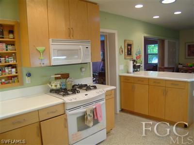 1433 Byron Road Fort Myers, FL 33919 - Photo 4 of 5 a utility room with dryer and washer