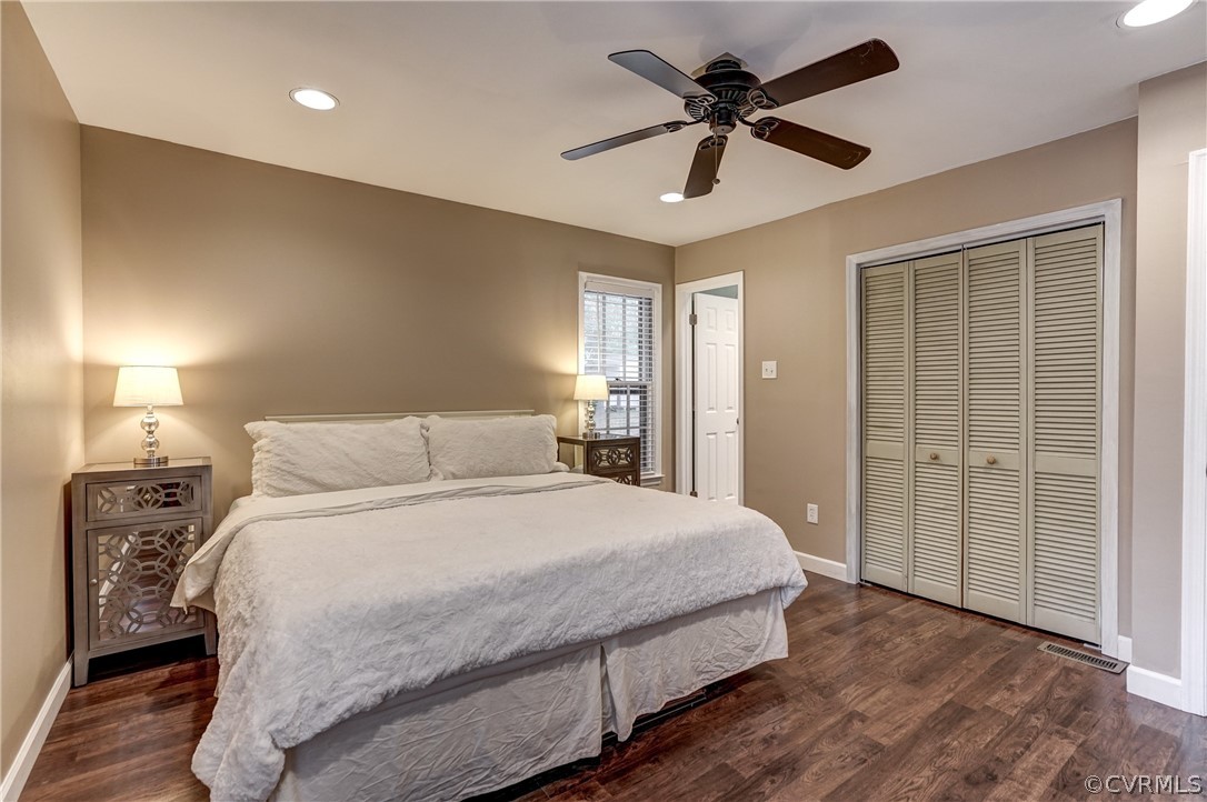 4801 Newbys Bridge Road Chesterfield, VA 23832 - Photo 17 of 34 a bedroom with a bed and a chandelier
