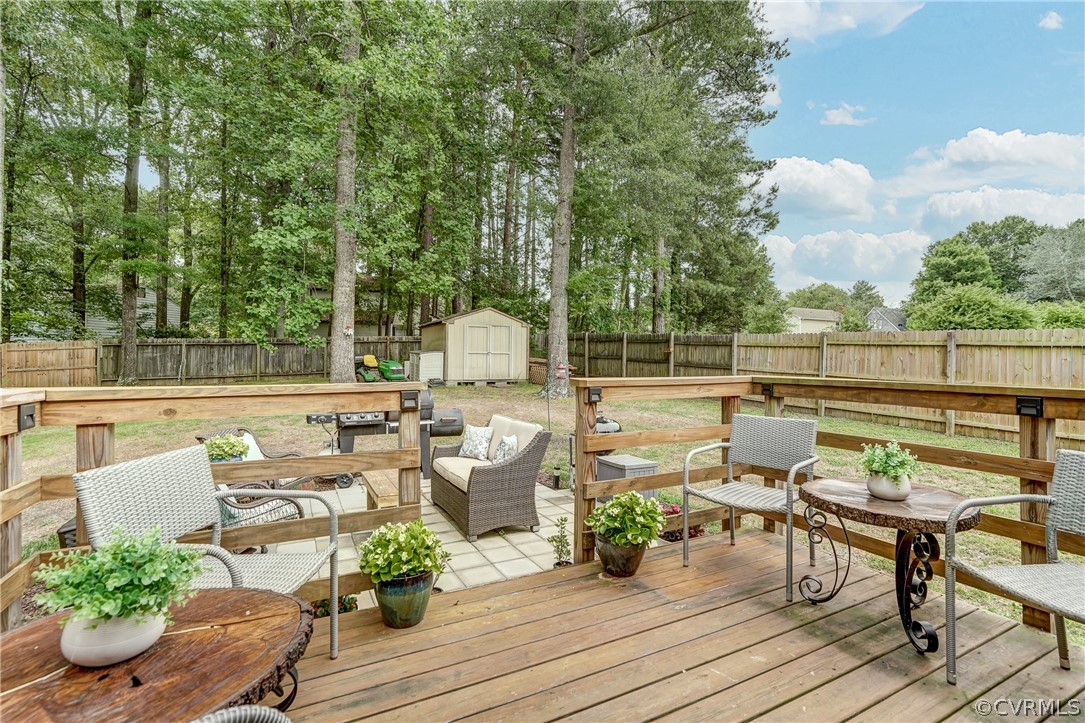 4801 Newbys Bridge Road Chesterfield, VA 23832 - Photo 23 of 34 a terrace with outdoor seating and trees