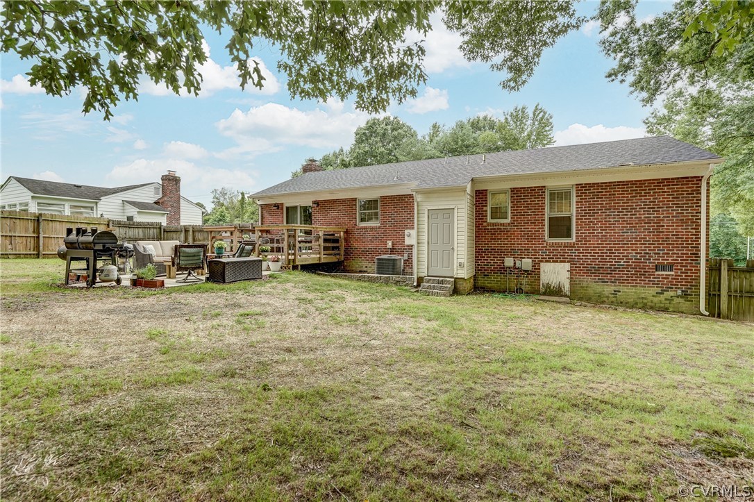 4801 Newbys Bridge Road Chesterfield, VA 23832 - Photo 27 of 34 a view of a house with backyard and a tree