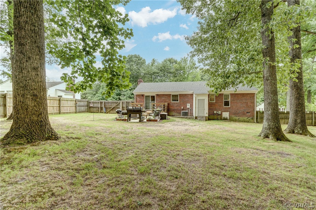 4801 Newbys Bridge Road Chesterfield, VA 23832 - Photo 32 of 34 a view of a house with backyard and a tree
