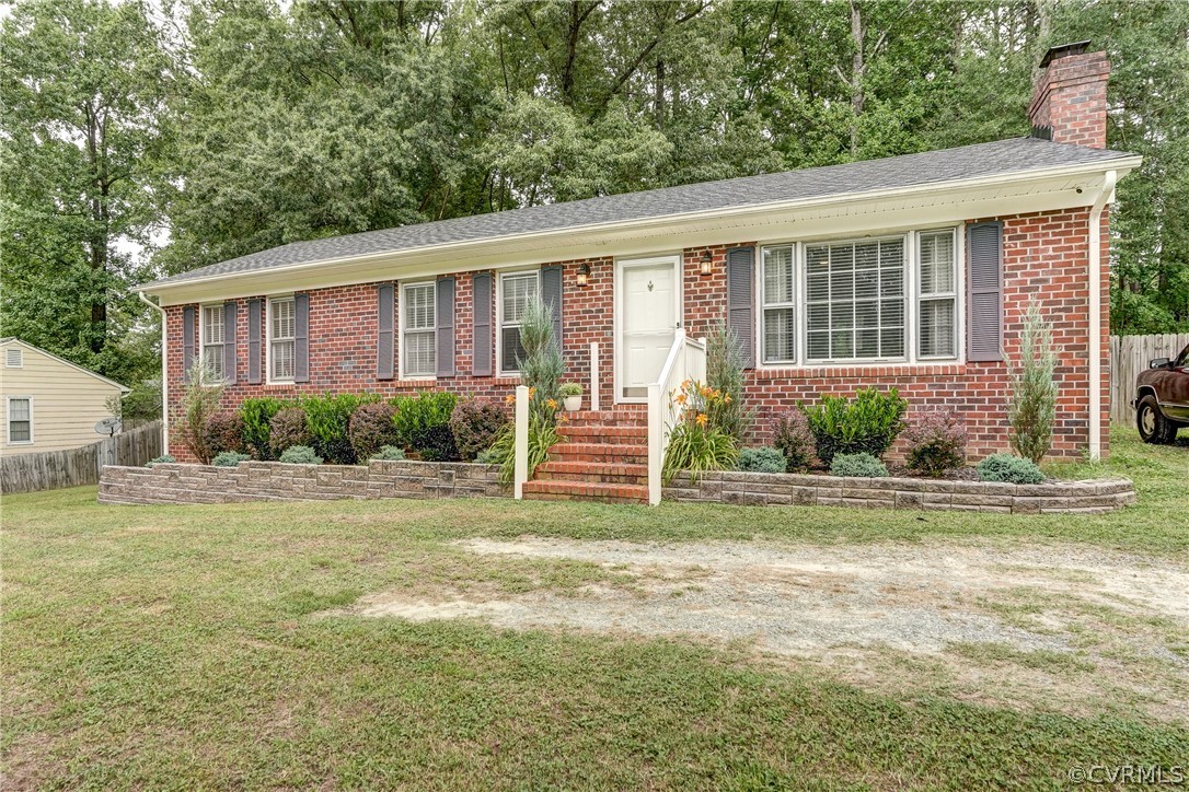4801 Newbys Bridge Road Chesterfield, VA 23832 - Photo 33 of 34 a view of a house with backyard and sitting area