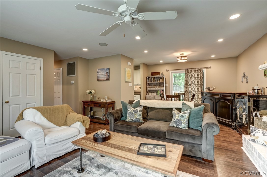 4801 Newbys Bridge Road Chesterfield, VA 23832 - Photo 9 of 34 a living room with furniture and a wooden floor