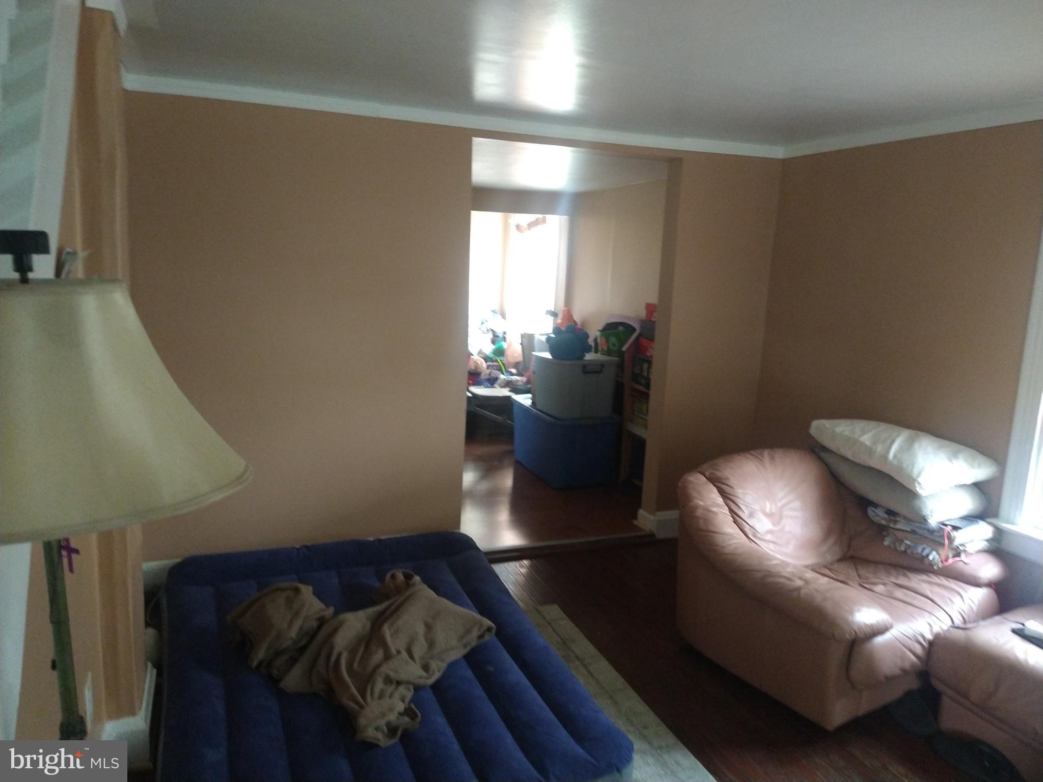 3031 North Rolling Road Windsor Mill, MD 21244 - Photo 22 of 32 Living Room