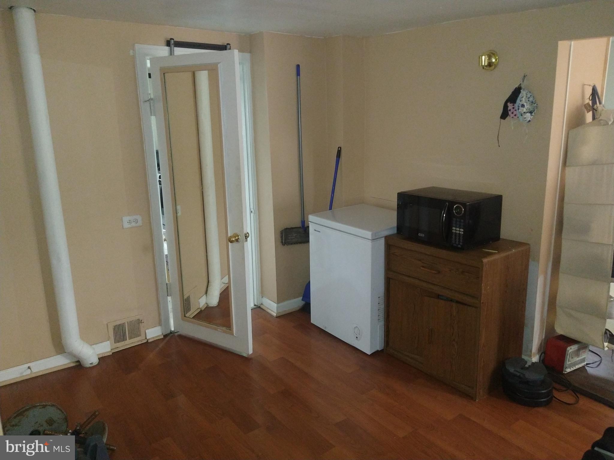 3031 North Rolling Road Windsor Mill, MD 21244 - Photo 23 of 32 Part of Living room area