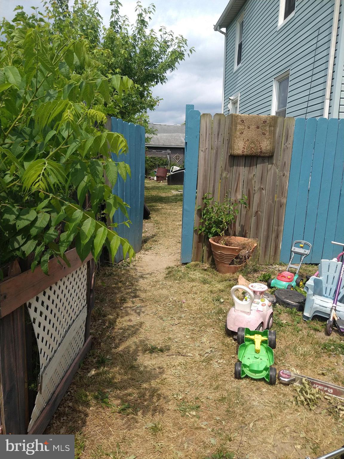 3031 North Rolling Road Windsor Mill, MD 21244 - Photo 26 of 32 Gate to Backyard