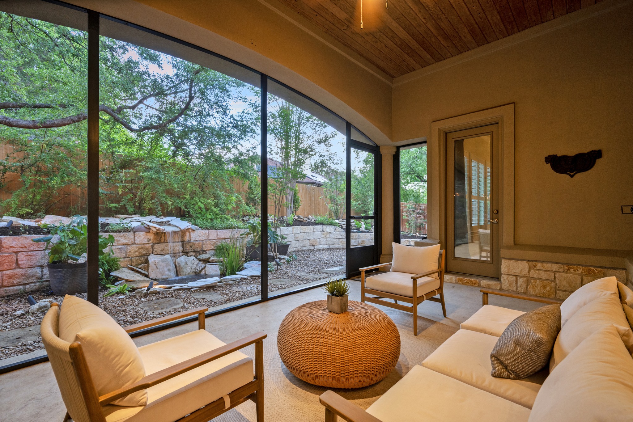 1012 Sailmaster Street Lakeway, TX 78734 - Photo 18 of 26 a outdoor living space with patio furniture and wooden floor
