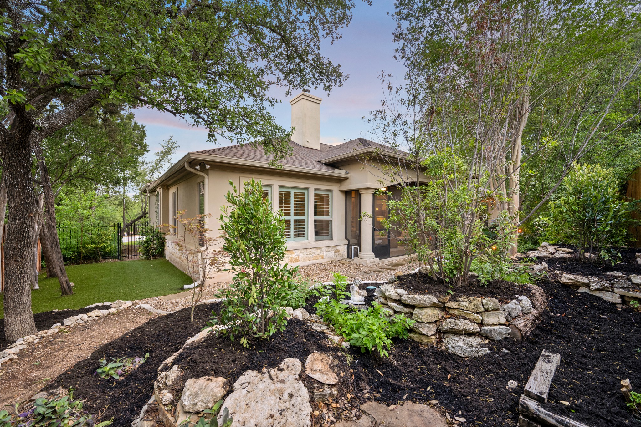 1012 Sailmaster Street Lakeway, TX 78734 - Photo 21 of 26 a front view of a house with garden