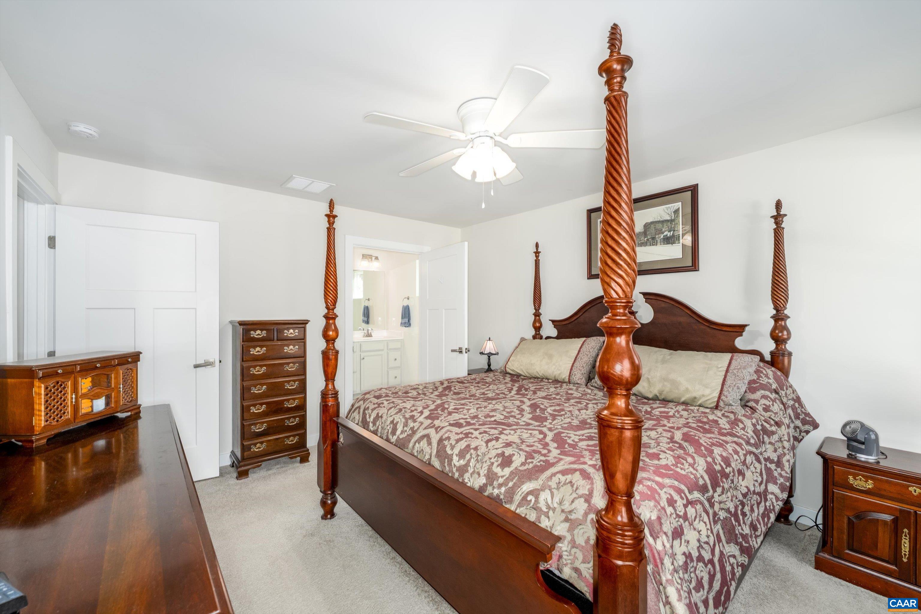 93 Archer Drive Palmyra, VA 22963 - Photo 26 of 45 a bedroom with a bed and wooden floor