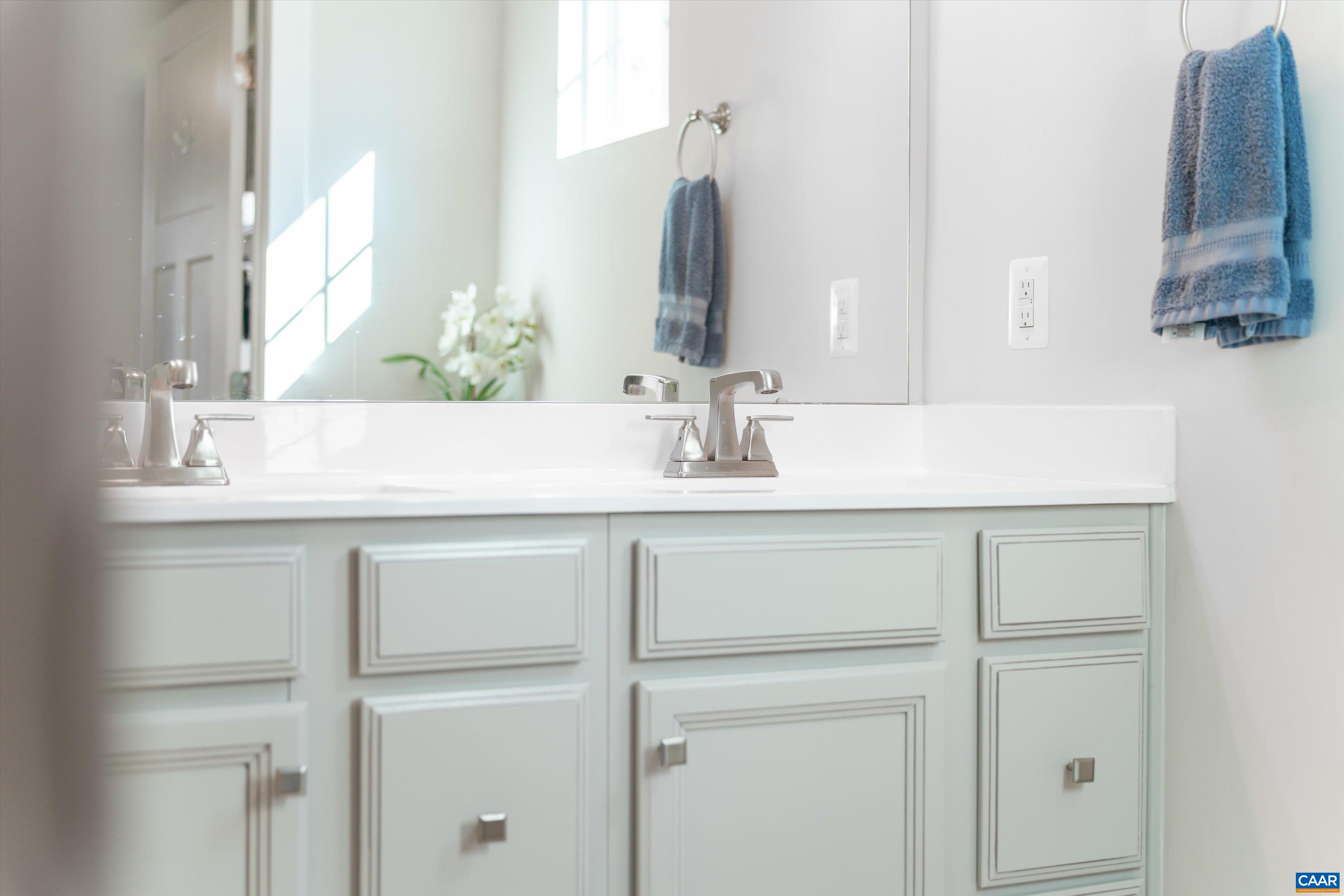 93 Archer Drive Palmyra, VA 22963 - Photo 29 of 45 a bathroom with a sink vanity and a mirror