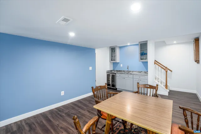 a view of kitchen and dining room with wooden floor