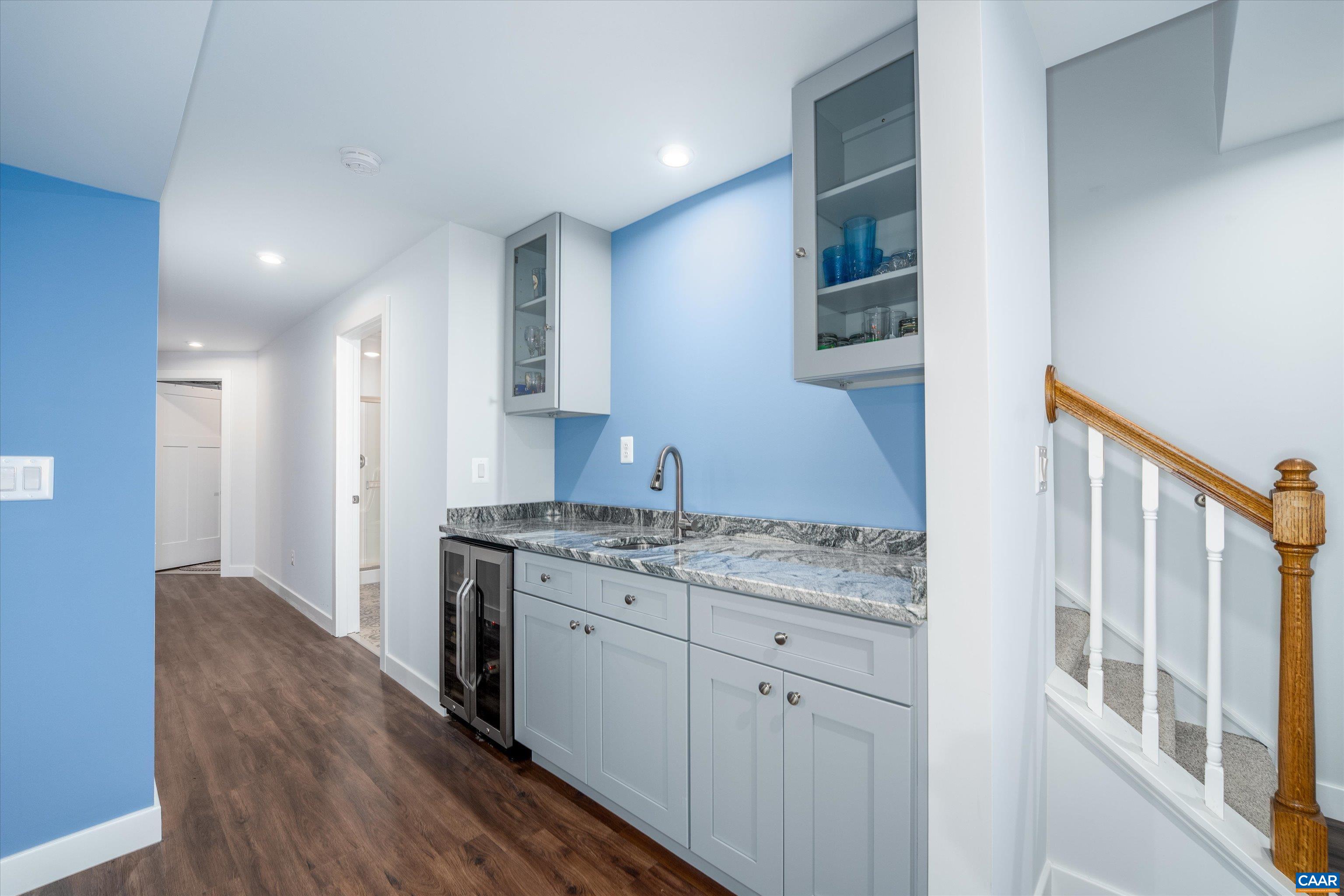 93 Archer Drive Palmyra, VA 22963 - Photo 31 of 45 a kitchen with a sink stove and cabinets