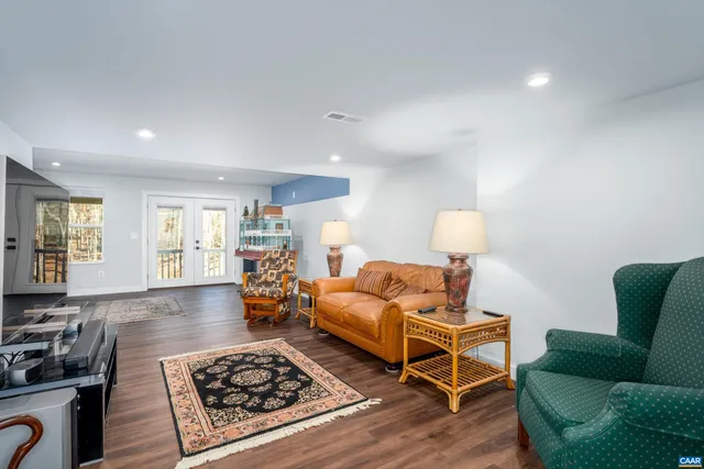 a living room with furniture and a couch