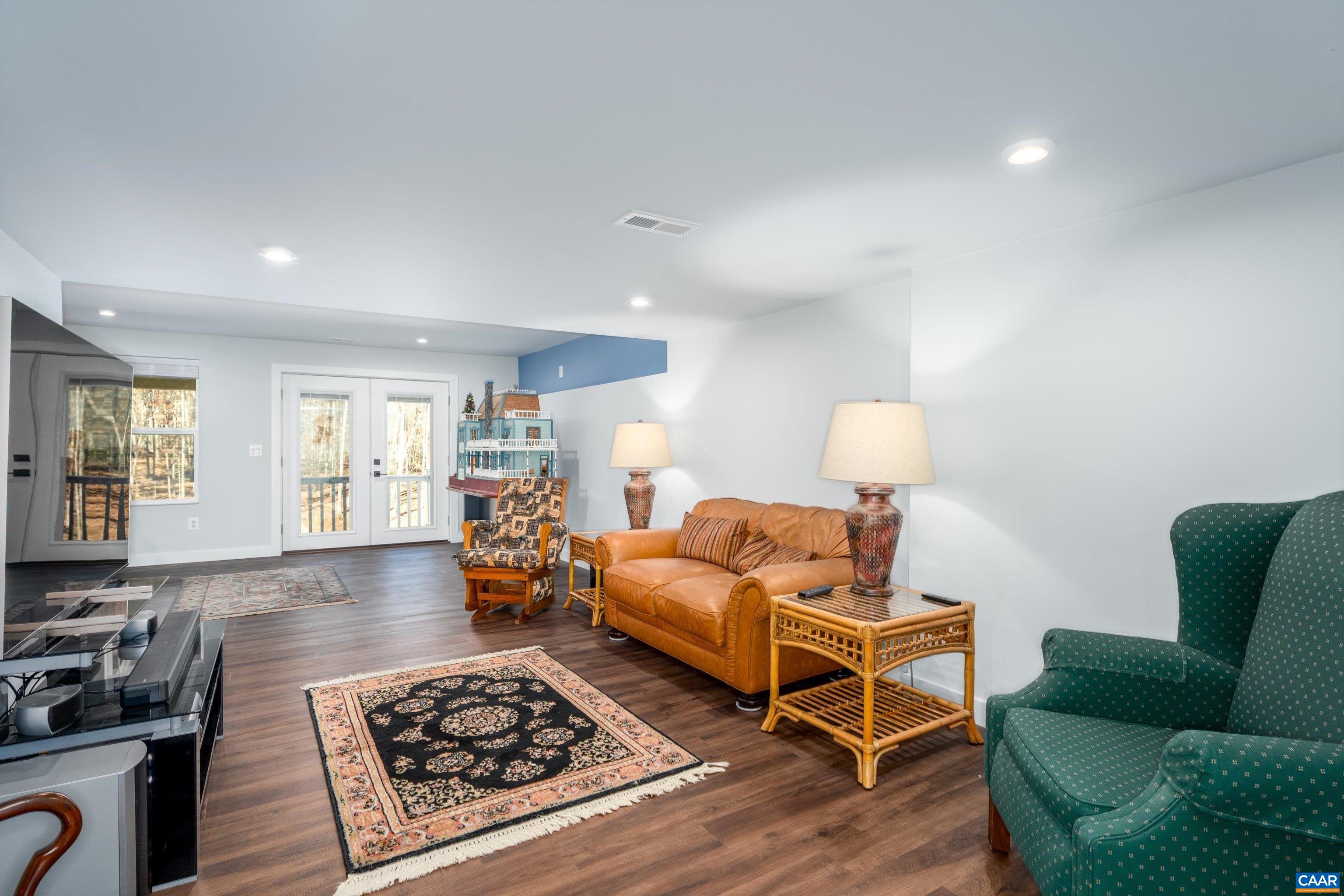 93 Archer Drive Palmyra, VA 22963 - Photo 35 of 45 a living room with furniture and a couch